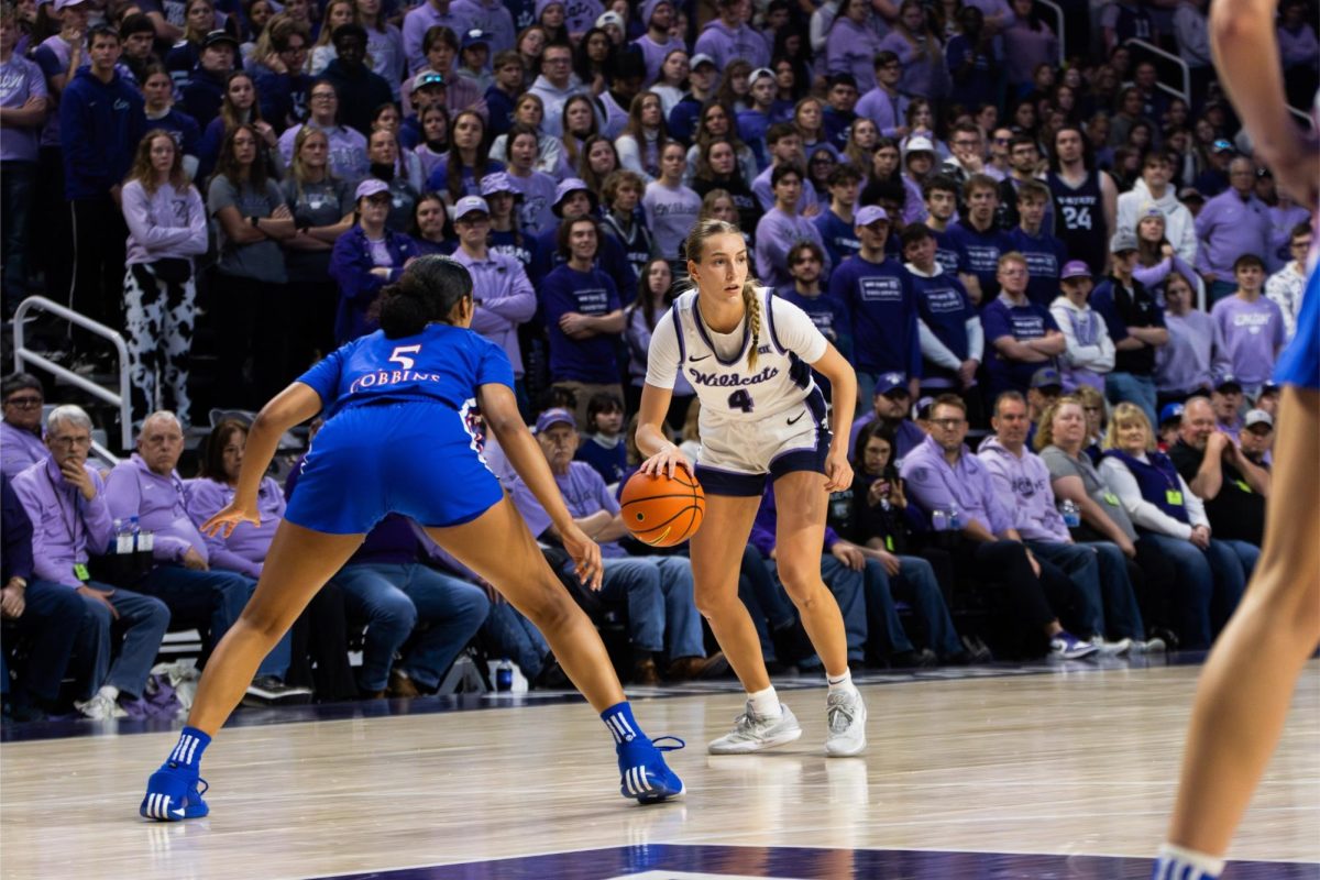 Guard+Serena+Sundell+looks+for+an+opening+facing+the+Jayhawk+defense.+The+Wildcats+hosted+Kansas+on+Jan.+20+at+Bramlage+Coliseum%2C+resulting+in+a+69-58+K-State+victory.