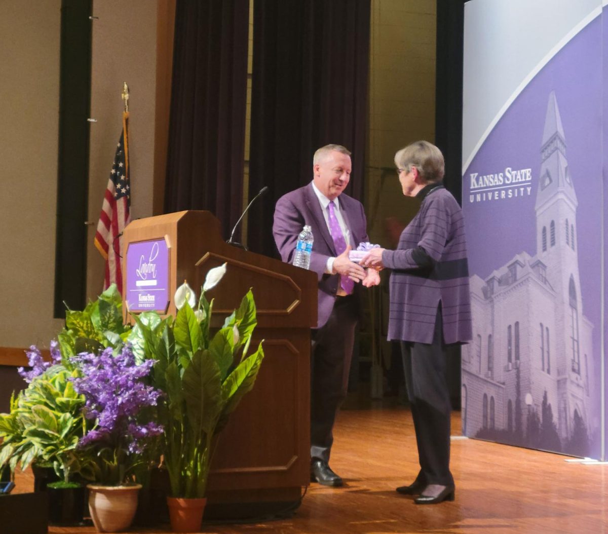 President Linton shakes the hand of Gov. Laura Kelly after her speech for the Landon Lecture Series.