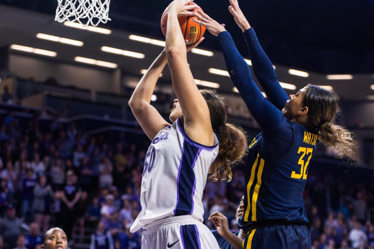 Center Ayoka Lee shots a layup in the 73-64 overtime win over No. 24 West Virginia. Lee scored 34 points and grabbed 12 rebounds in 26 minutes of play.