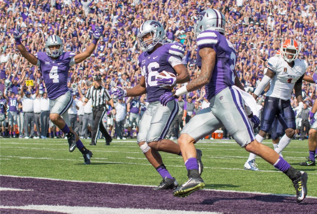 Freshman doubleback Kaleb Prewett celebrates after Senior wide receiver Tyler Lockett scores a touchdown during the game vs. UTEP on Sept. 27, 2014 in Bill Snyder Family Stadium. (Archive photo by George Walker)