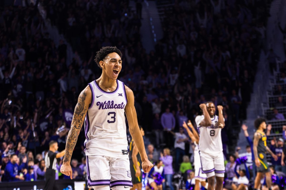 Freshman+guard+Dorian+Finister+yells+in+excitement+following+the+Wildcat+win+over+the+Baylor+Bears.+The+Wildcats+beat+the+Bears+68-64+in+overtime+on+Jan+16+at+Bramlage+Coliseum.+