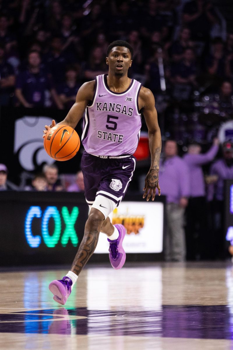Guard Cam Carter drives down the court against Oklahoma State. K-State won 70-66 as Carter scored 15 points on nine shots.