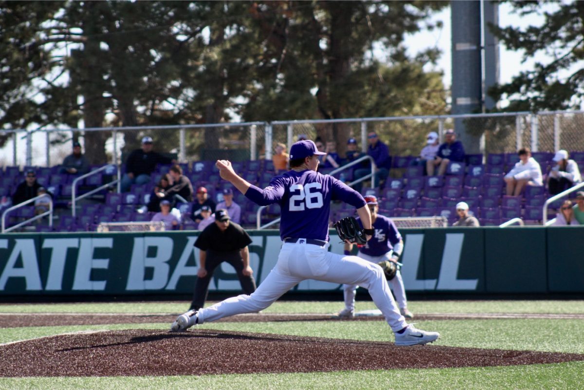 Southpaw pitcher Owen Boerema draws back for the pitch in Game 3 against Holy Cross. Boerema started the game and pitched for 5 2/3 innings, earning 11 strikeouts and the win for K-State.
