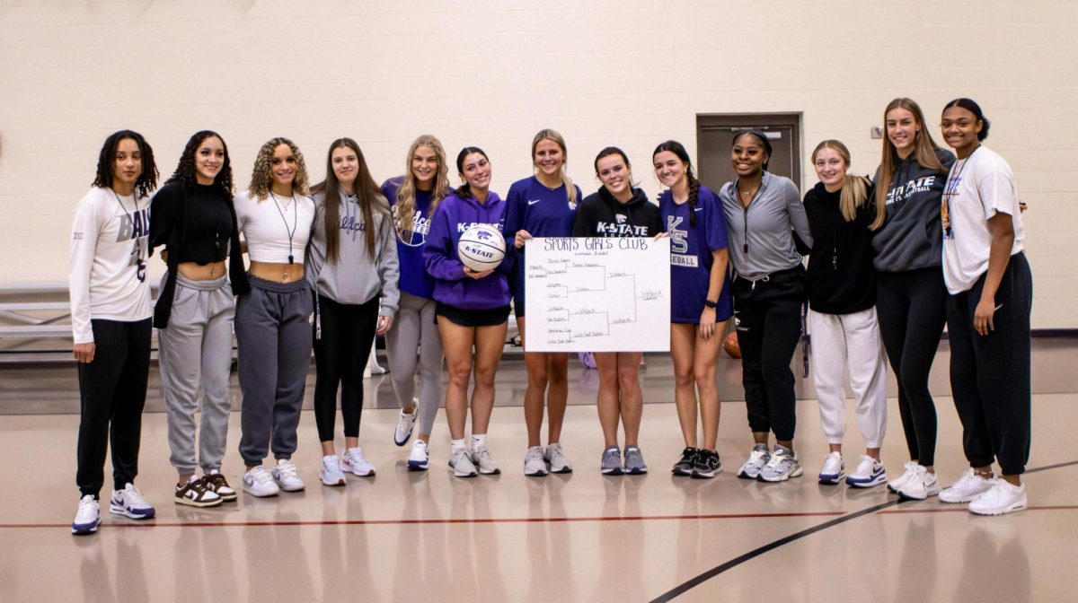 The winners of the women's bracket Sports Girls Club basketball tournament the 