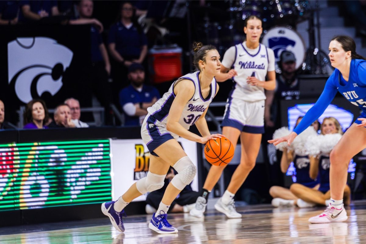 Forward Gisela Sanchez makes her way around the BYU defense. The Wildcats beat the Cougars Jan. 27 67-65 at Bramlage Coliseum.