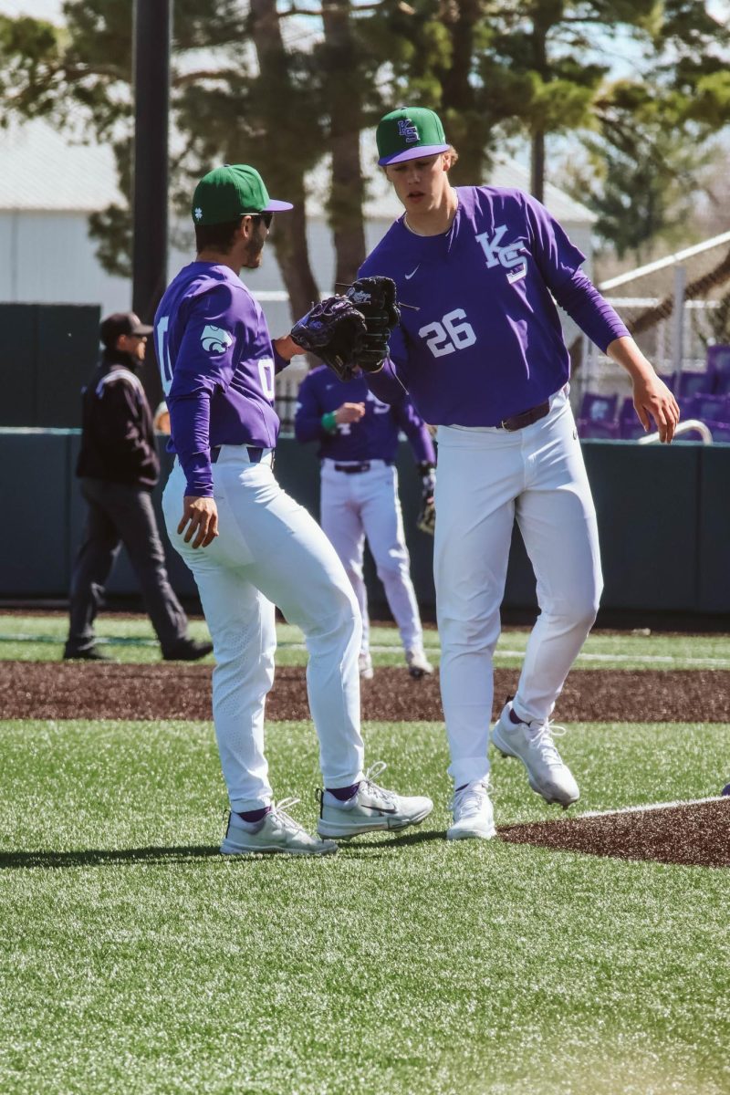 Pitcher+Owen+Boerema+fist+bumps+third+baseman+Jaden+Parsons+during+their+match+against+Missouri+State.+Boerema+left+the+Bears+scoreless+during+his+time+at+the+mound+as+the+Wildcats+won+11-3.