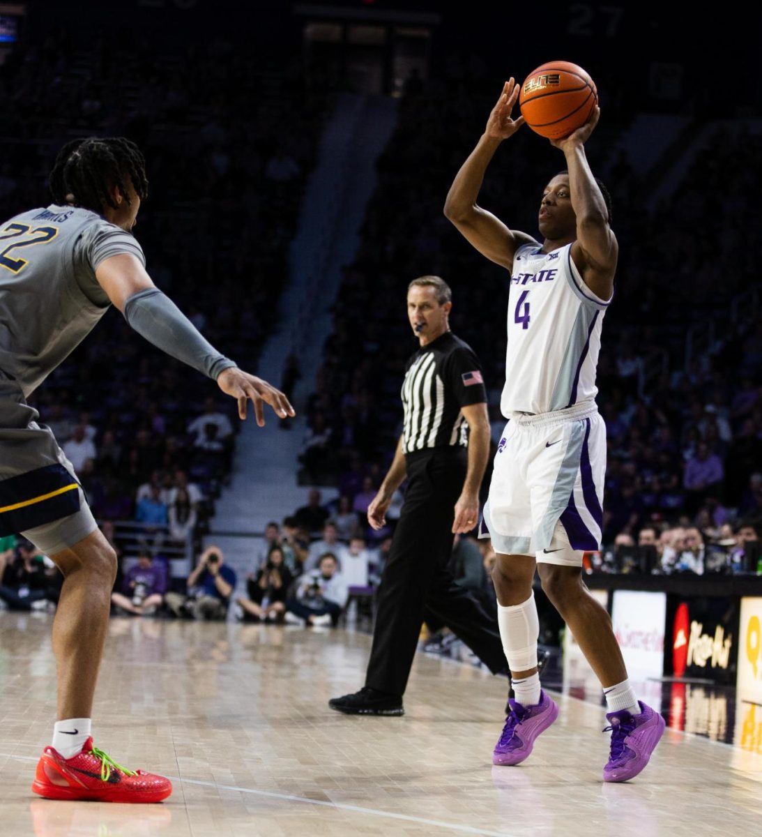 Dai Dai Ames shoots a 3-pointer in the game against West Virginia University on Feb. 26, 2024 in Bramlage Coliseum. The Wildcats beat the Mountaineers in overtime 94-90. 
