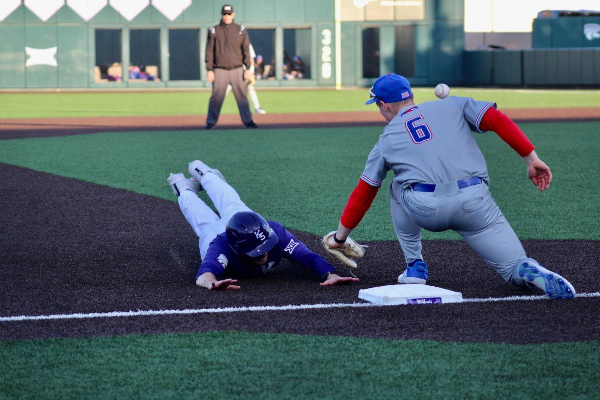 Infielder Jaden Parsons dives and secures third base against UMass Lowell. The Wildcats beat the River Hawks 17-3 in Game 2 Saturday.