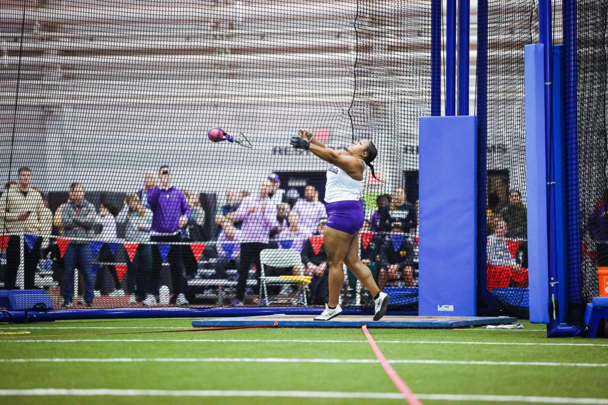 Thrower+Monique+Hardy+participates+in+the+weight+throw+at+the+KU-KSU-WSU+Triangular+on+Jan.+12.+Hardy+set+the+weight+throw+school+record+at+the+event%2C+reaching+22.13m%2F72-7.25%2C+eight+inches+further+than+her+previous+best+of+21.93m%2F71-11.5.+%28Photo+courtesy+of+K-State+Athletics+%7C+Austin+VanMeter%29