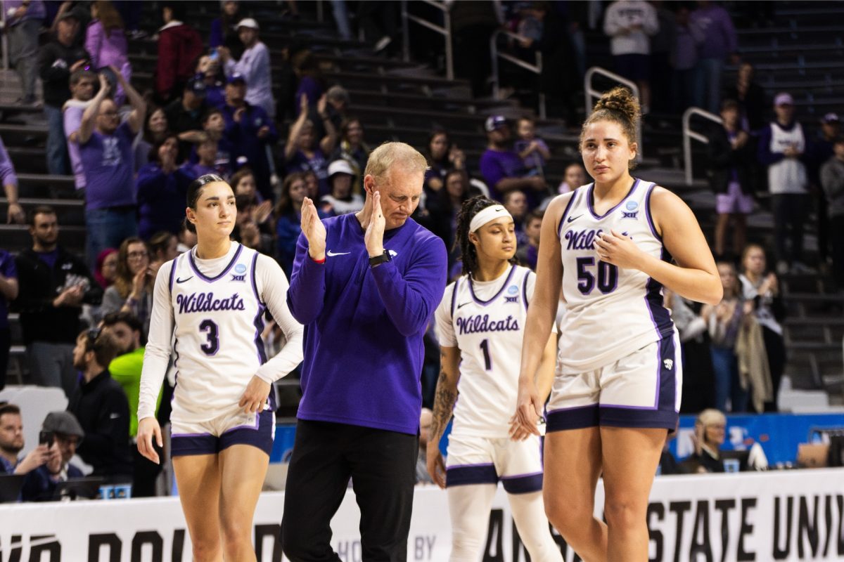 After the game, head coach Jeff Mittie, surrounded by guards Jaelyn Glenn and Zyanna Walker and center Ayoka Lee, applauds the Bramlage Coliseum crowd. K-State fell in the round of 32 to Colorado 63-50 in front of a sold-out Bramlage Coliseum.