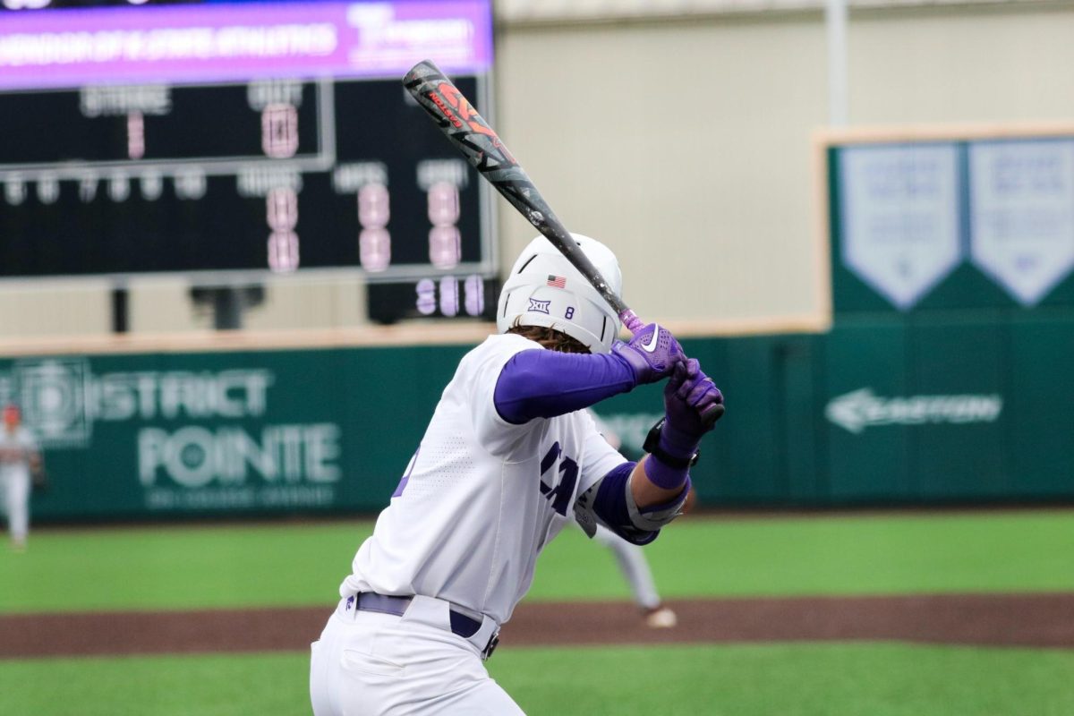 Freshman Nick English stands up to bat, ready for the upcoming pitch. K-State won 6-5 against Oklahoma State on April 19 in a12-inning fight at Tointon Family Stadium.