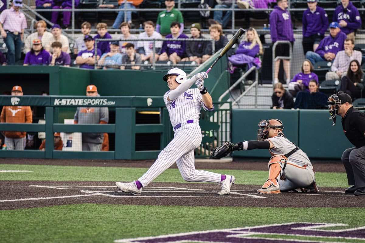 Infielder+David+Bishop+swings+for+the+pitch+and+hits+a+home+run+against+Texas+March+28.+In+Fridays+match+against+Oklahoma+State%2C+Bishop+secured+the+walk-off+in+extra+innings+for+a+Wildcat+win.