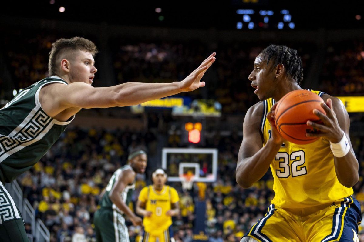 Michigan+transfer+forward+Tarris+Reed+Jr.+faces+up+during+the+73-63+loss+to+Michigan+State.+Reed+averaged+8.9+points+and+7.2+rebounds+on+the+season+and+has+entered+the+transfer+portal.+%28Photo+courtesy+of+Grace+Lahti+and+The+Michigan+Daily%29