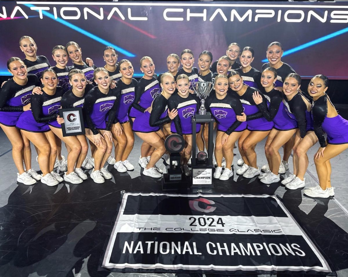 The Classy Cats pose with the D1A Pom first place trophy. The Classy Cats won the competition for the third year in a row at the College Classic in Orlando, Florida. (Photo courtesy of Jenna Gillespie)
