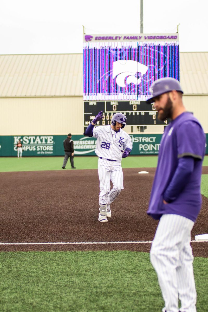 Catcher Raphael Pelletier rounds the bases in Game 2 against Oklahoma State. The teams ended the series Sunday, K-State dropping the final game but winning the series 2-1.
