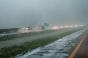 Travelers headed west on I-70 slow down due to accumulations of hail on the highway after storms caused problems April 26, 2016. (Archive photo by Evert Nelson | The Collegian)