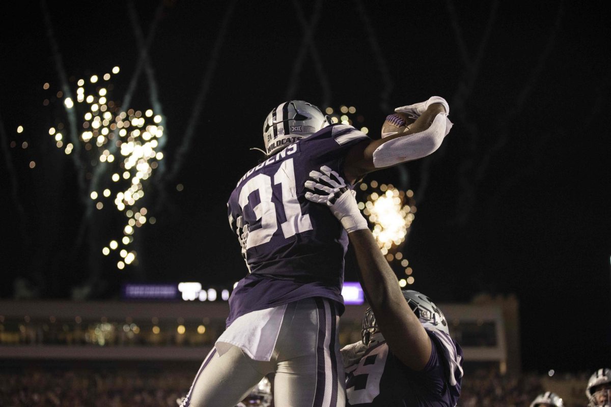 After scoring a touchdown, then-sophomore running back DJ Giddens celebrates in the end zone against Central Florida on Sept. 23, 2023, in Bill Snyder Family Stadium.