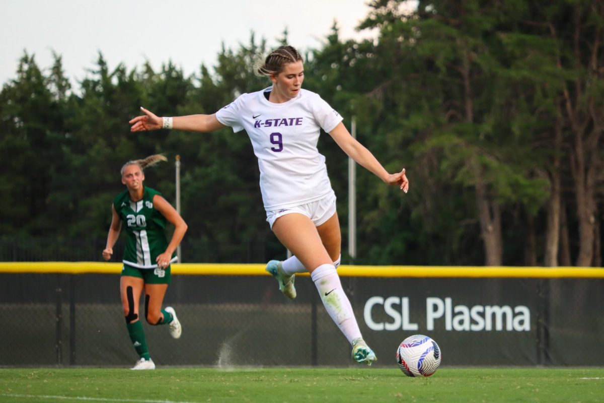 Sophomore forward Ryann Reynolds lines up for a strike against Green Bay on Thursday night. The Wildcats defeated Green Bay 6-1, tying the program record for goals in a single game. 