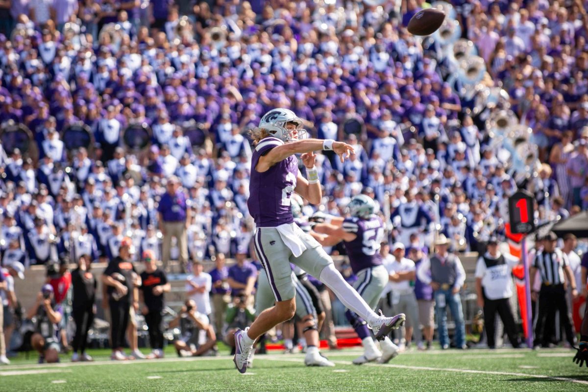 Sophomore quarterback Avery Johnson unloads downfield in No. 23 K-State's 42-20 victory over No. 20 Oklahoma State. Johnson set career highs in passing yards and completions with five total touchdowns. 