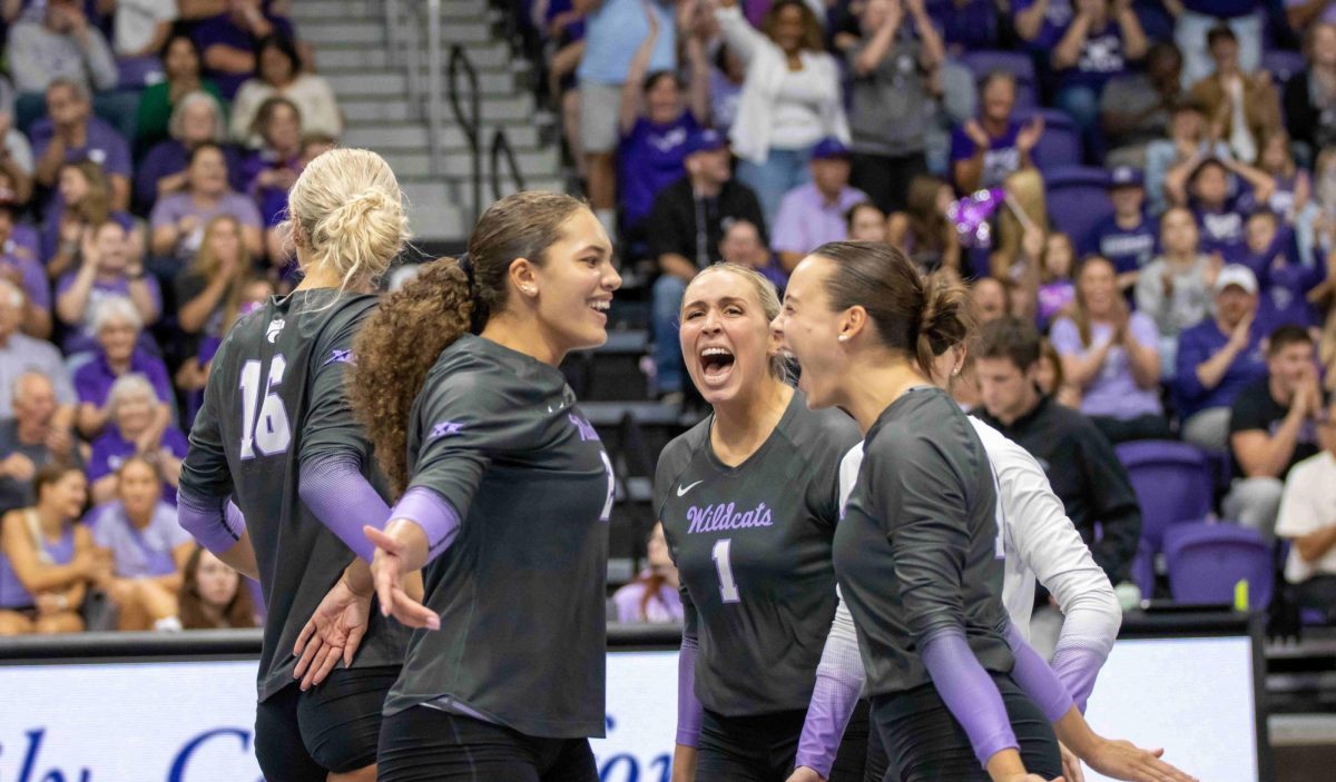 Hitter Liz Gregorski celebrates the point with her teammates. The Wildcats defeated the Horned Frogs in a 5-set thriller 3-2 on Sept. 22 at Morgan Family Arena. 