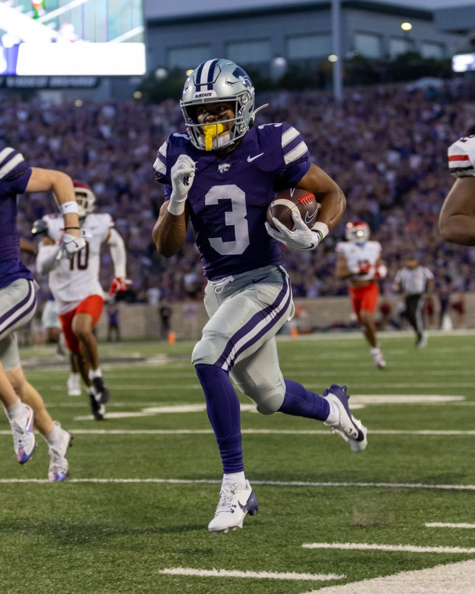 Running back Dylan Edwards charges downfield as he returns a punt for a touchdown in a home win against No. 20 Arizona on Friday, Sept. 13. The Colorado transfer scored in his third consecutive game, finding the endzone in every game as a Wildcat. 