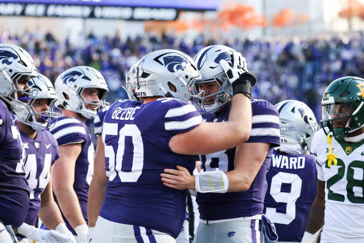 Former quarterback Will Howard and offensive lineman Cooper Beebe celebrate after a touchdown in 2023. Beebe is now the starting center for the Dallas Cowboys. (Archive photo | Collegian Media Group)