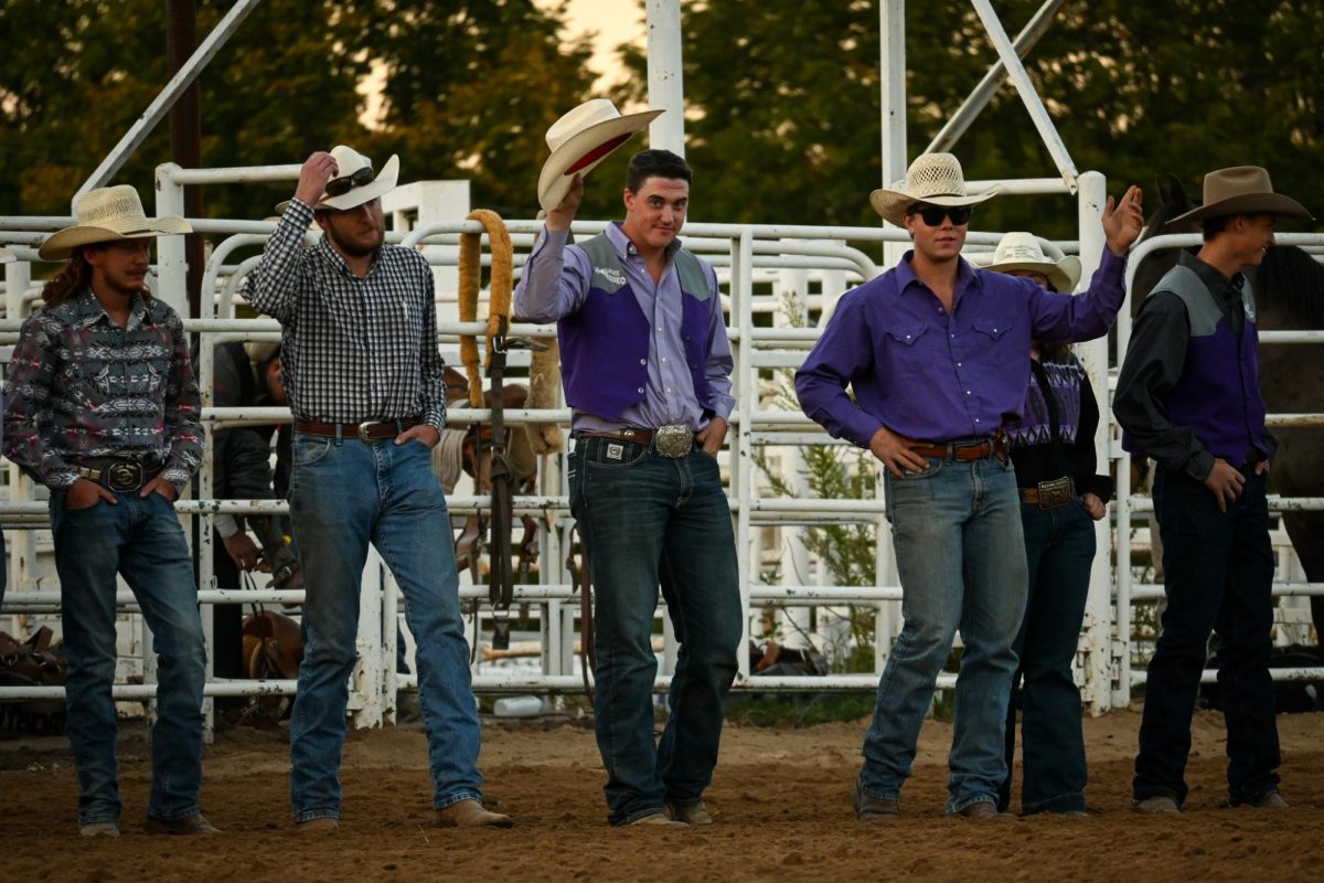 Officers from the K-State Rodeo club/team line up during the rodeo on Saturday.