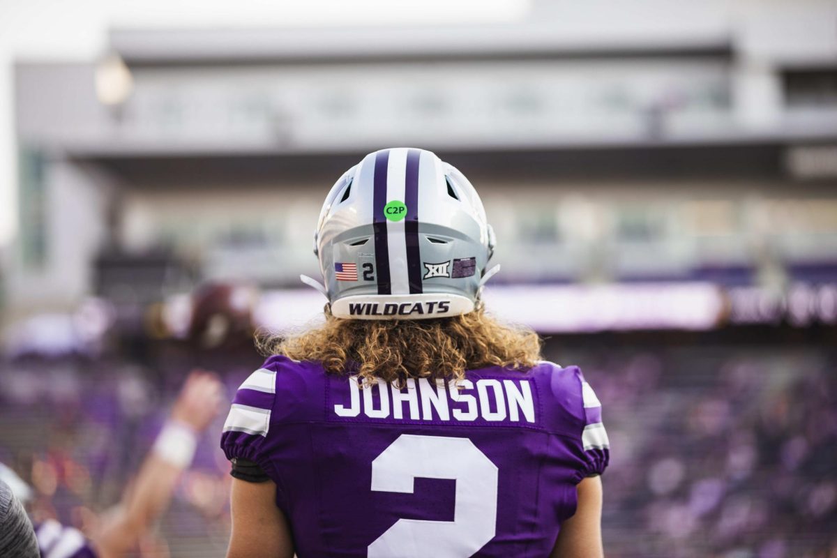 Quarterback Avery Johnson surveys the atmosphere at Bill Snyder Family Stadium against Arizona on Sept. 13. K-State won 31-7 in the matchup of the Wildcats. 