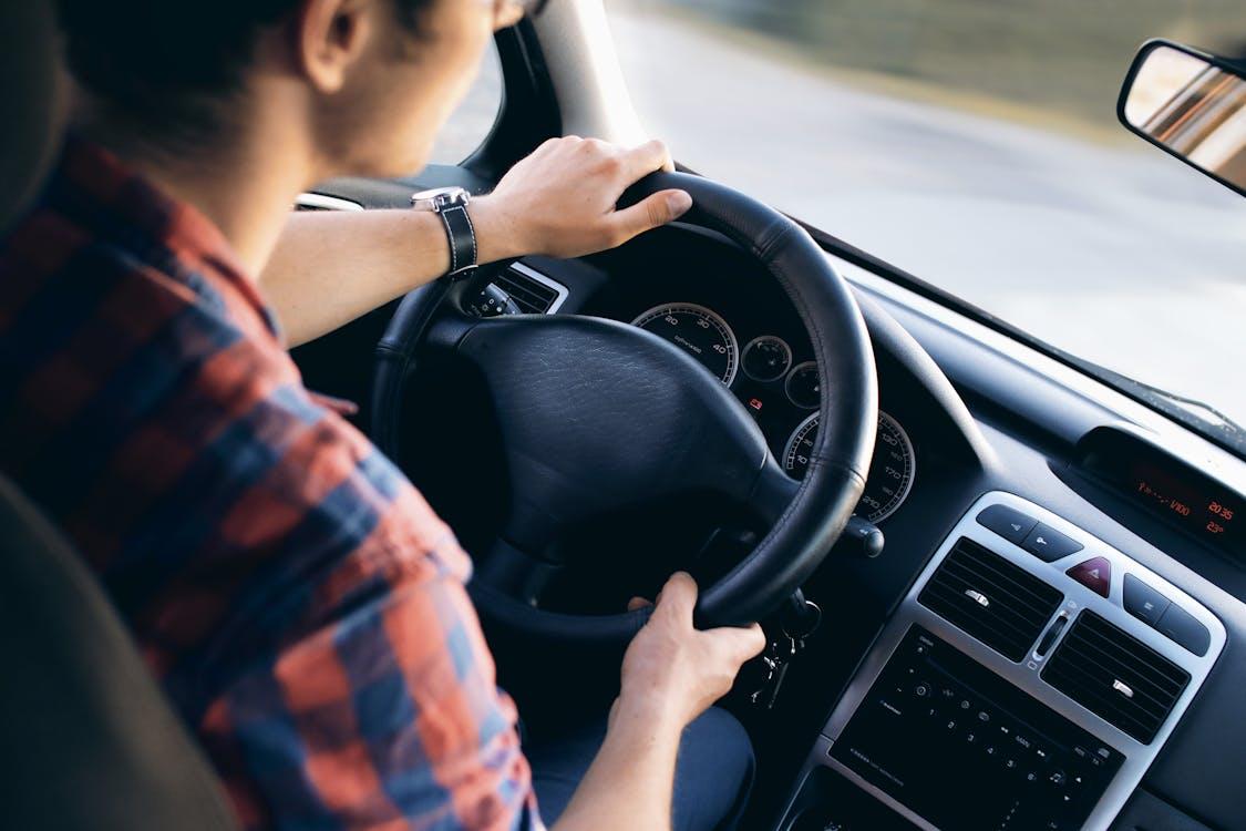 Free Man Inside Vehicle Stock Photo