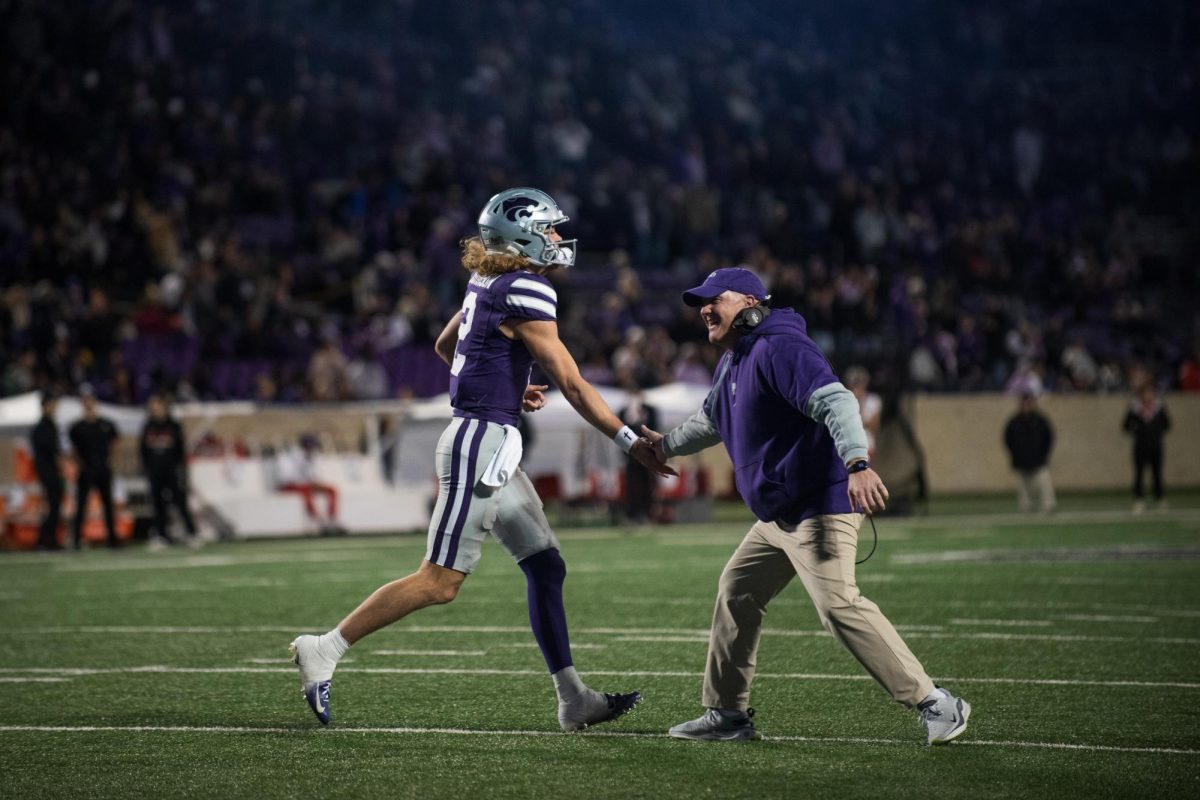 Head coach Chris Klieman and quarterback Avery Johnson celebrate during K-State's win over Cincinnati on No. 24. K-State snapped a two-game skid with a 41-15 win.