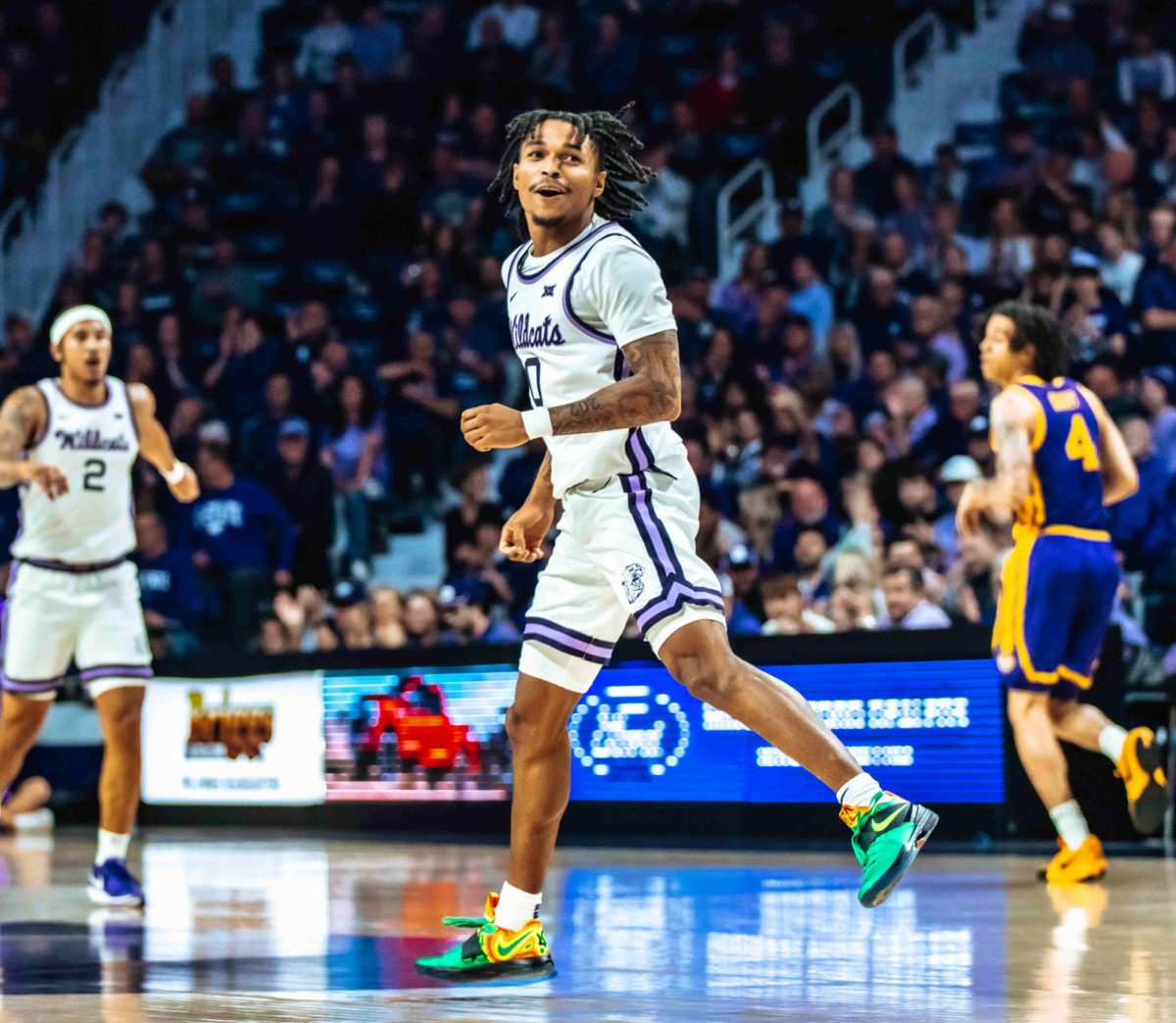 Junior Dug McDaniel hustles back on defense after scoring for K-State. The Wildcats fell to LSU 76-65 on Nov. 14 at Bramlage Coliseum.

