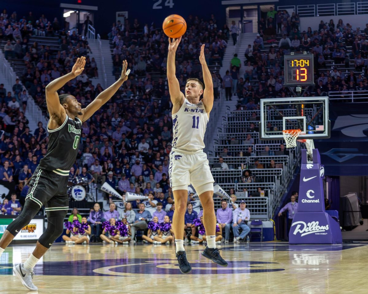 Guard Brendan Hausen pulls up for a 3-pointer against Cleveland State on Nov. 9. The Villanova transfer scored a career-high 22 points in the 77-64 win.