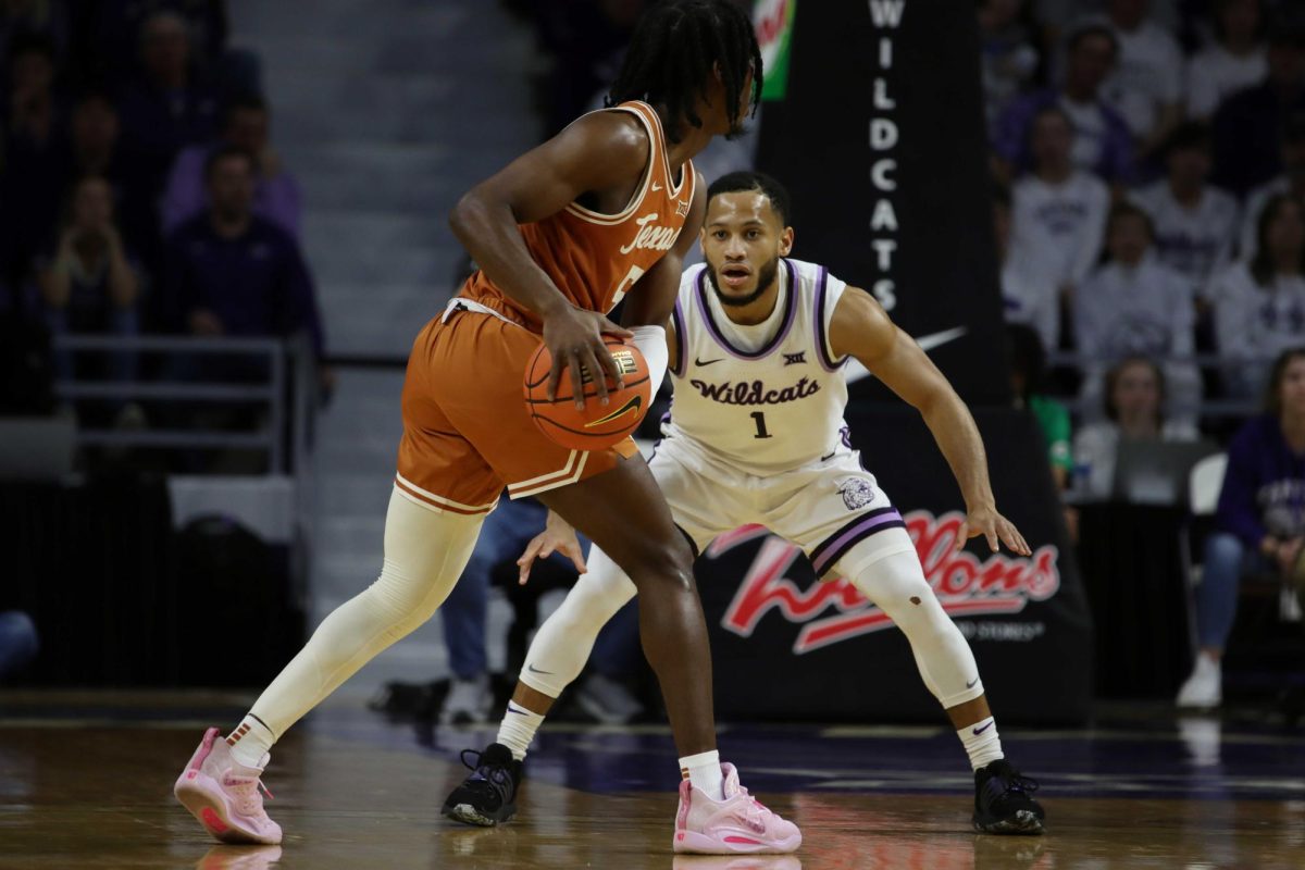 Senior guard Markquis Nowell defends the ball in the game against Texas. K-State lost the matchup 69-66. Nowell went on to break the NCAA record for assists in a March Madness game as the Wildcats went on to the Elite Eight.