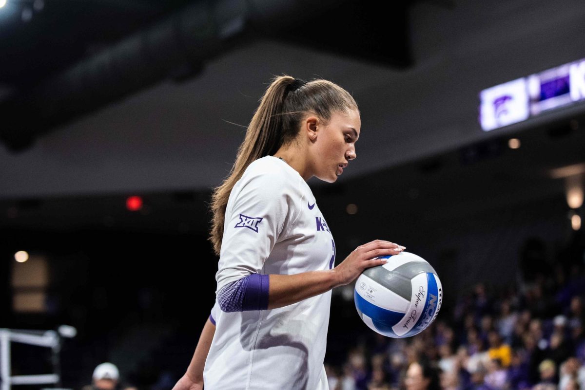 Outside hitter Aliyah Carter prepares for a serve at Morgan Family Arena during the 2024 season. Carter finished her K-State career first in the rally-scoring era with a.n average of 3.92 kills per set.