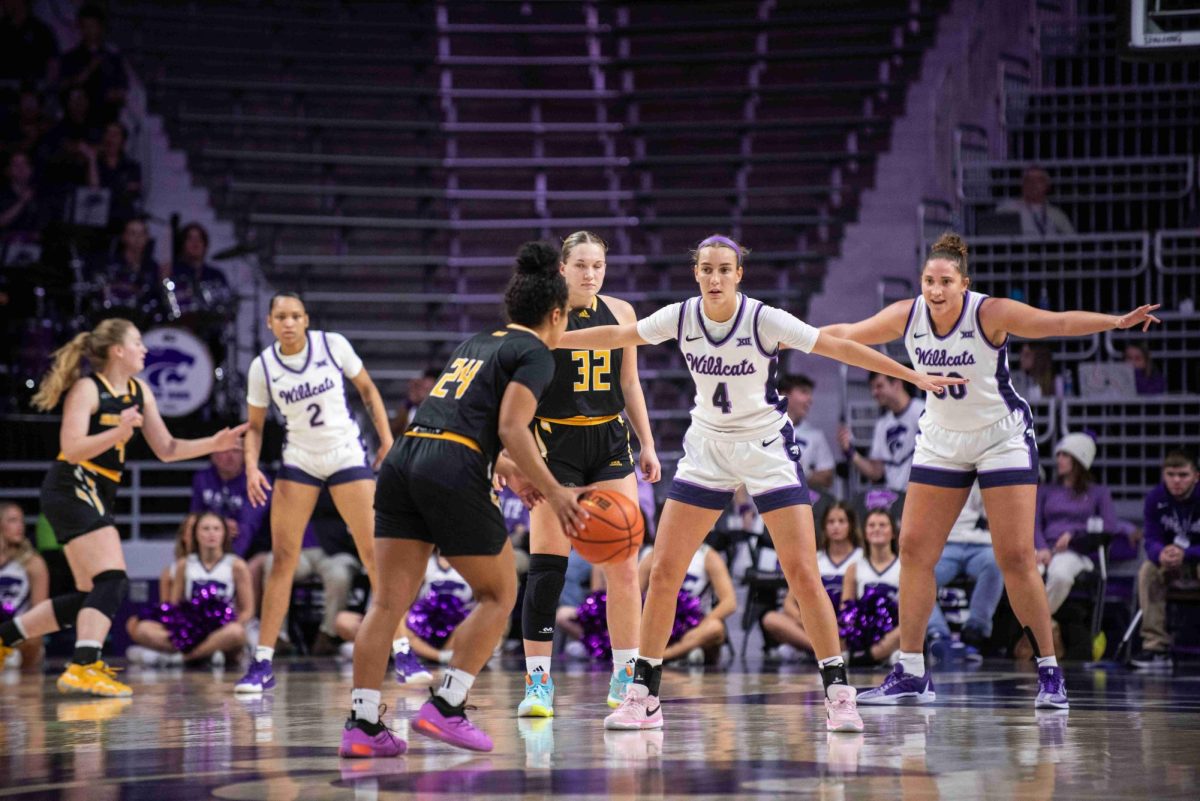 Guard Serena Sundell (4) leads the defense as center Ayoka Lee (50) and forward Temira Poindexter (2) establish the backcourt. The Wildcats forced fourteen steals and nine blocks in a 111-46 win over Milwaukee.