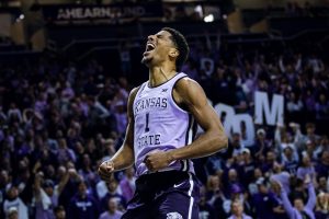 Kansas State center David N'Guessan exclaims during K-State's 73-60 win over West Virginia on Saturday, ending a six-game losing streak.