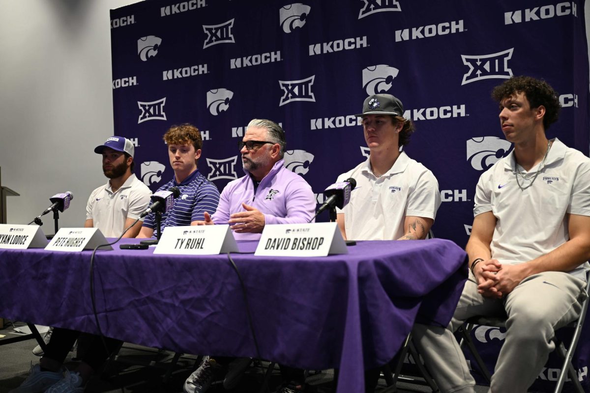 From left to right, sophomore Nick Enlgish, redshirt junior Kyan Lodice, head coach Pete Hughes, senior Ty Ruhl and senior David Bishop talk to the media ahead of the 2025 Kansas State baseball season. The Wildcats made the program's first super regional since 2013 last season, "setting the standard" in the program.