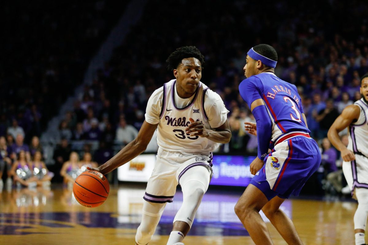 Max Jones smiles after scoring with teammate. The Wildcats continued their winning streak to 6 games with a 73-70 win over Arizona on Feb. 11 at Bramlage Coliseum.