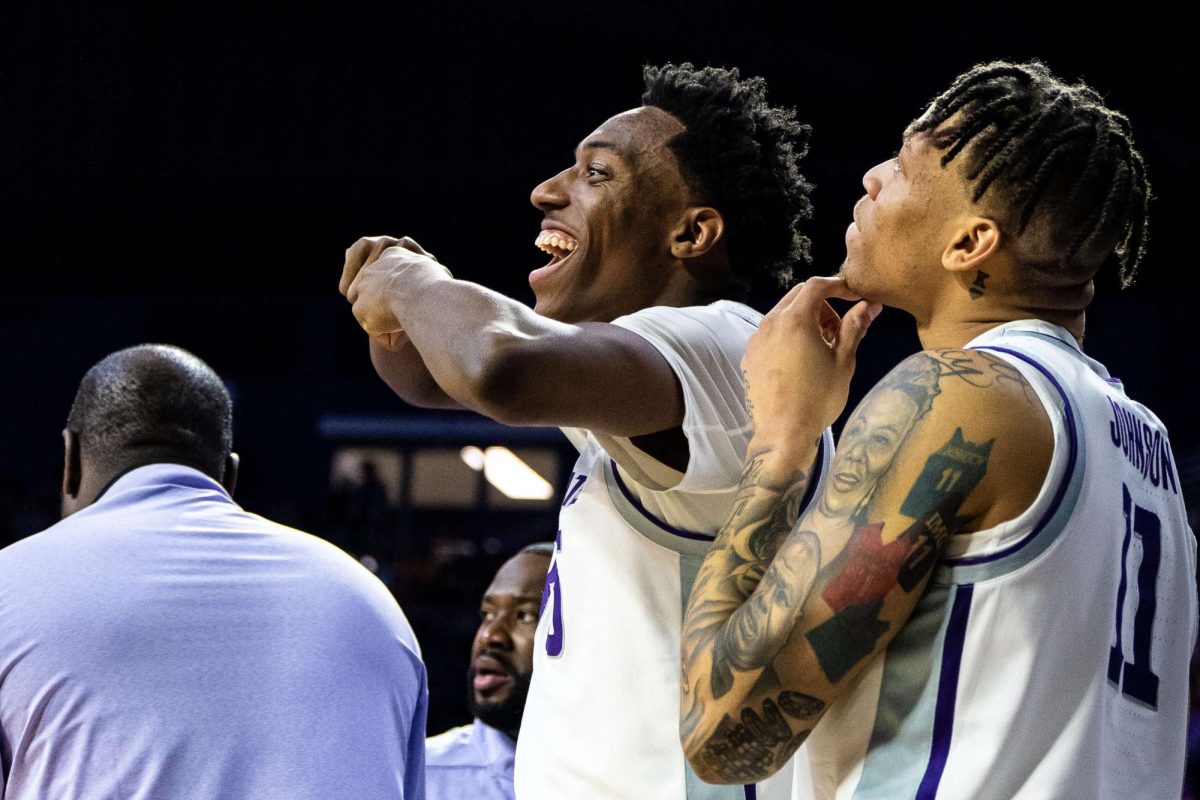 Kansas State forwards Nae’Qwan Tomlin and Keyontae Johnson react to the game during a Kansas State men’s basketball game against Texas Christian University at Bramlage Coliseum on February 7, 2023. Kansas State won 82-61. 