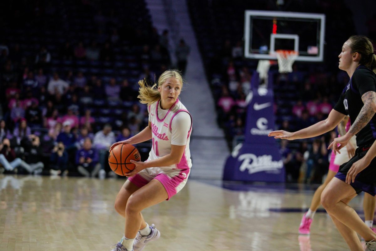 Sophomore guard Taryn Sides looks to make a move at Bramlage on Jan. 21 as K-State secured a 59-50 victory over No. 9 TCU.

