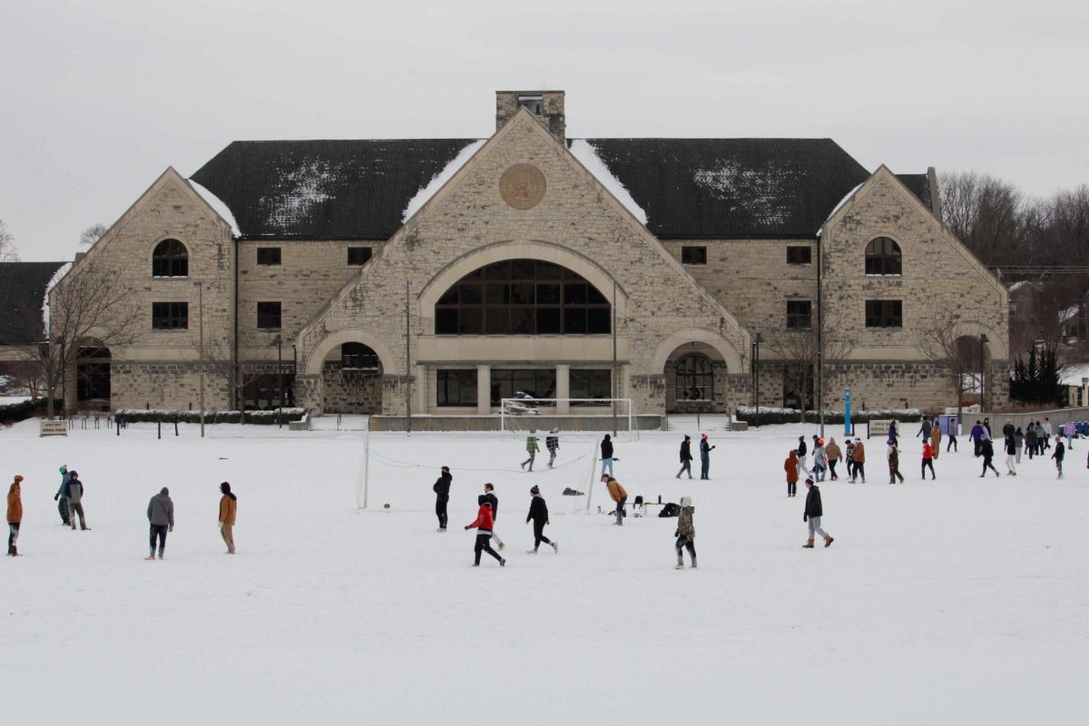 Groups of students flocked to Memorial Stadium on Feb. 12 to play snow football after classes were cancelled on account of winter weather. 