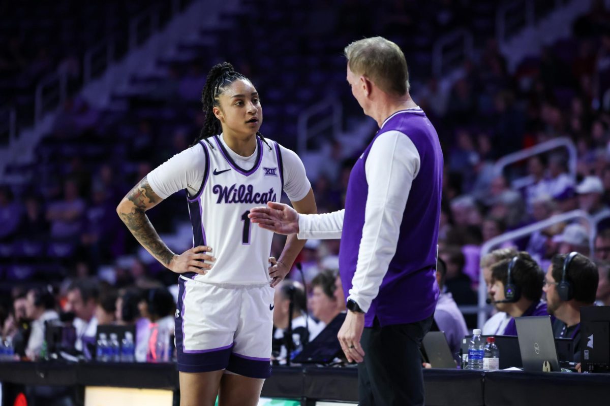 K-State guard Zyanna Walker talks with head coach Jeff Mittie against Iowa State on Jan. 30, 2025.