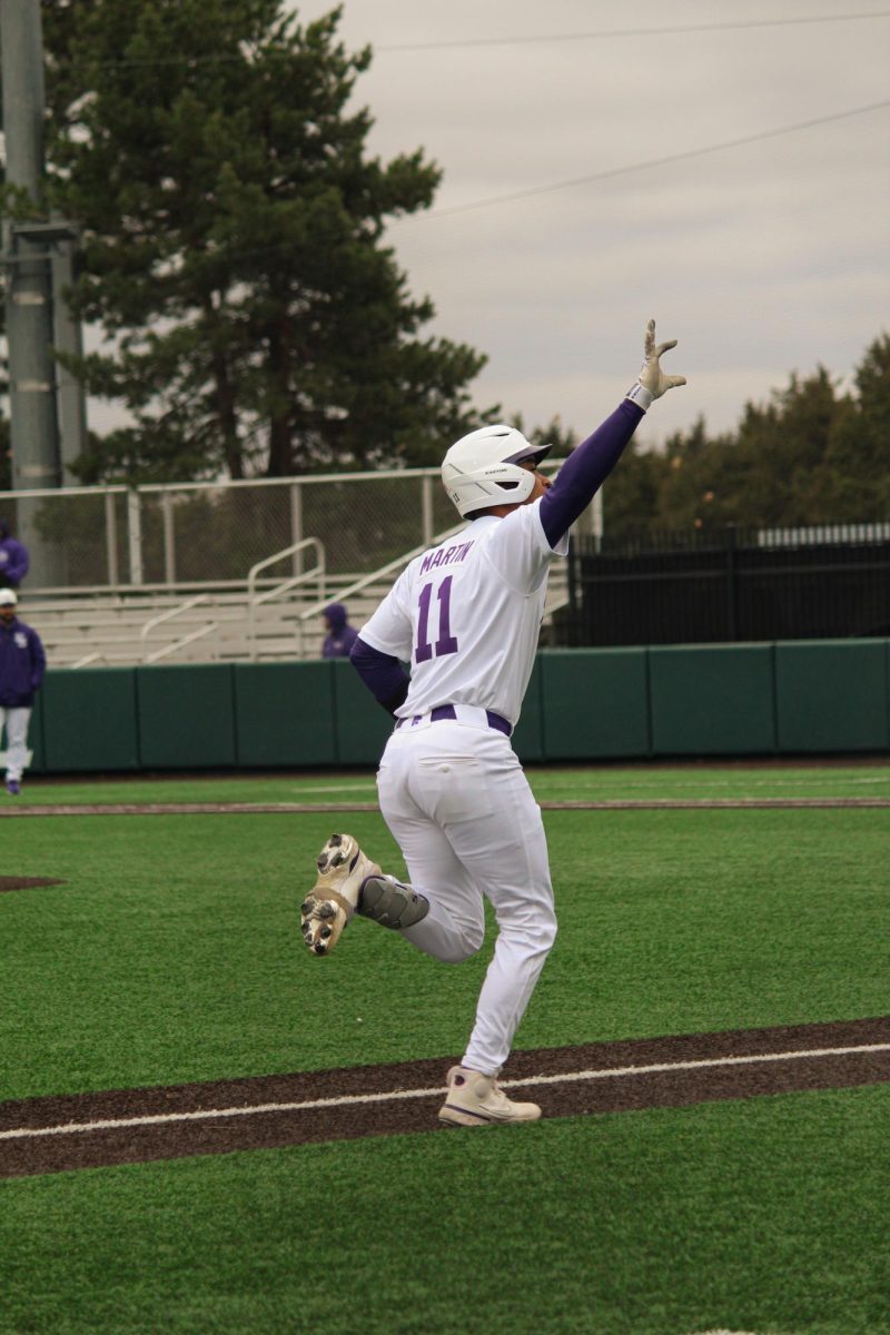 K-State shortstop Max Martin flashed the "Go 'Cats" hand sign as he trots home after a home run on Friday. Martin finished the sweep against William & Mary, hitting .667 with 12 RBI, seven runs scored, and eight hits, which included five home runs and one double. 