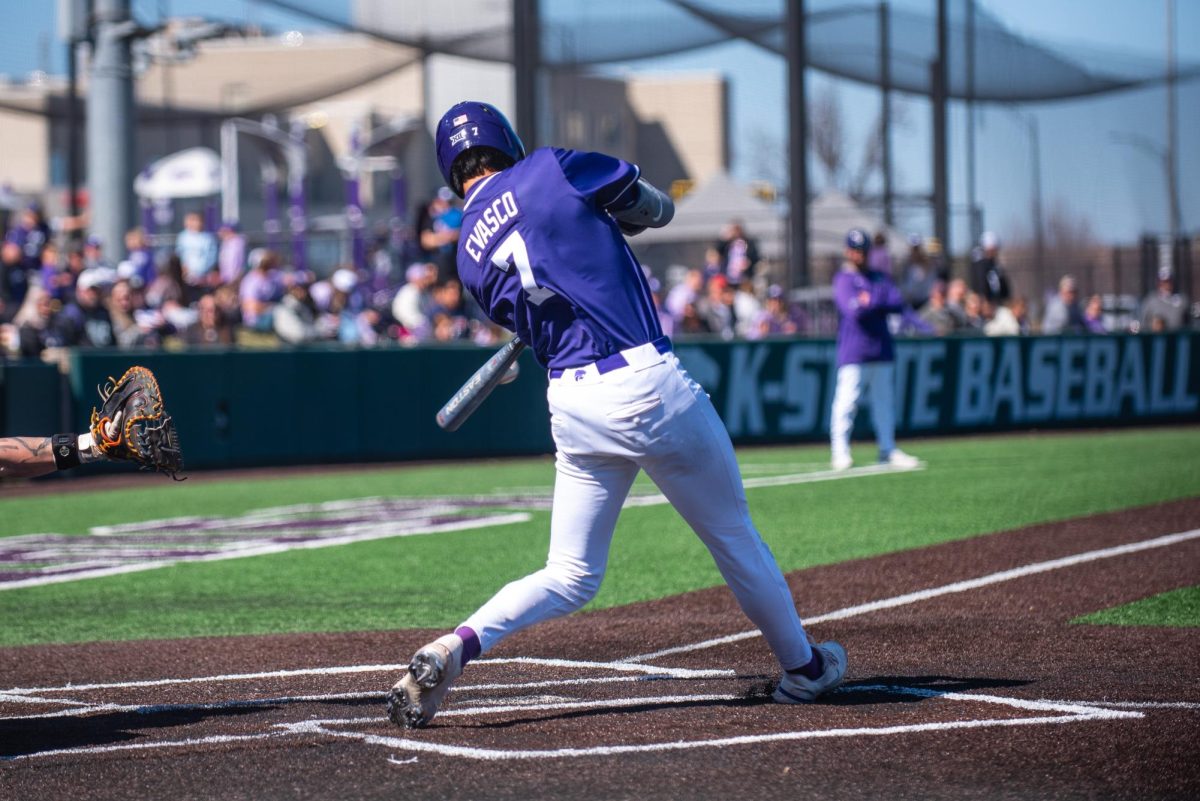 K-State right fielder AJ Evasco makes contact with the ball for a single in the sixth inning of Game 3 against Utah on March 16 at Tointon Family Stadium.


