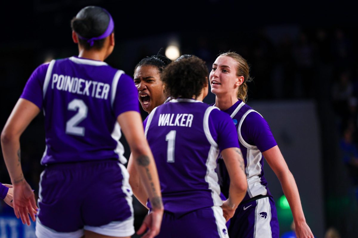 K-State players Serena Sundell (back right), Zyanna Walker (front right), Temira Poindexter (front left) and Kennedy Taylor (back left) celebrate a score during the Round of 32 victory over No. 4 seed Kentucky. No. 5 seed K-State won 80-79 to advance to the program's first Sweet 16 since 2002. (Photo Courtesy of K-State Athletics)