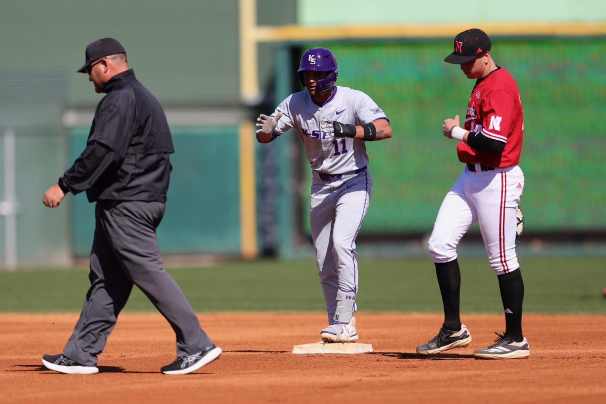 K-State shortstop Max Martin gestures at his teammates on second base during the Wildcats’ win over Nebraska at the Frisco Classic (Courtesy Photo | K-State Athletics)