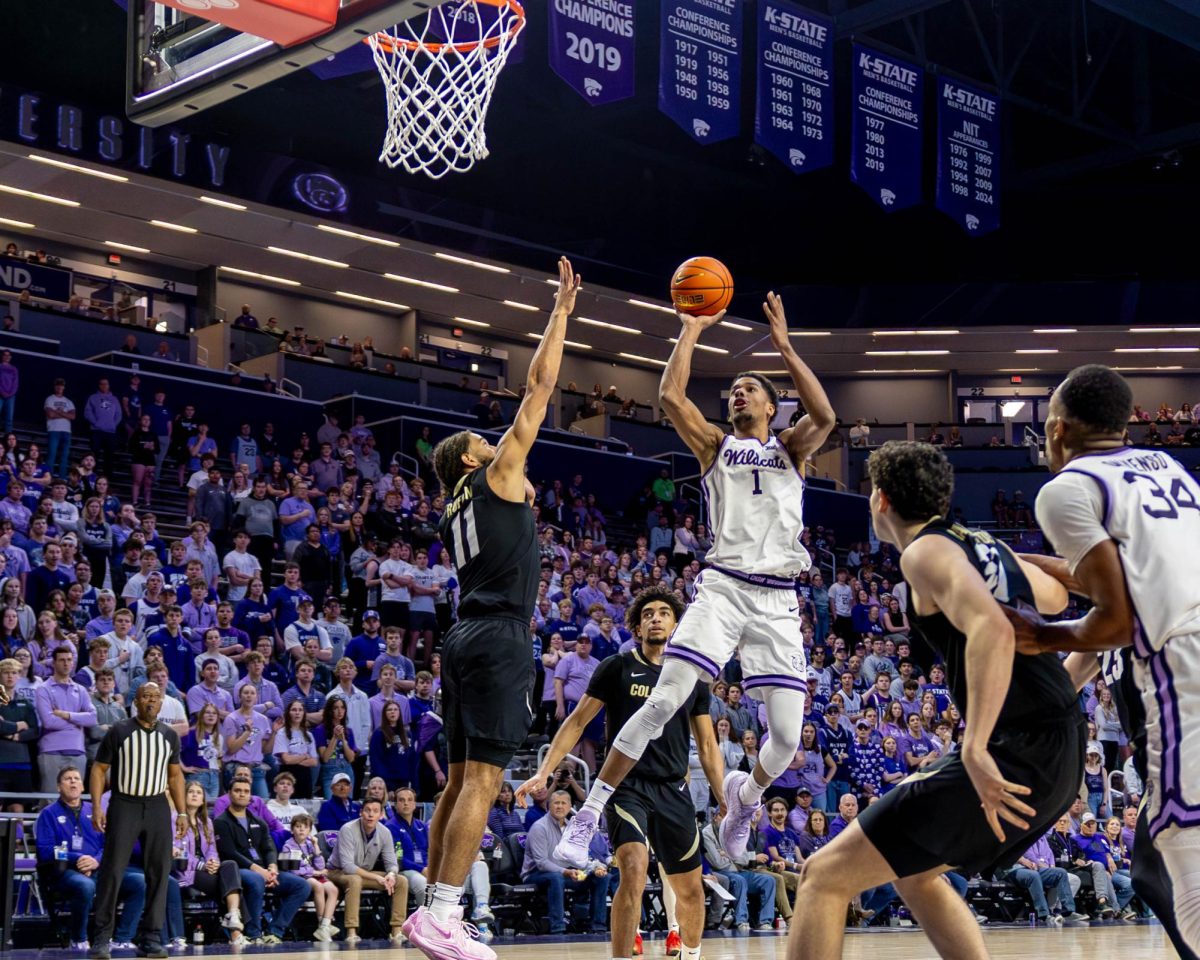 K-State forward David N'Guessan shoots during K-State's win over Colorado on Sunday. The super senior finished with 21 points, eight rebounds, and two steals.