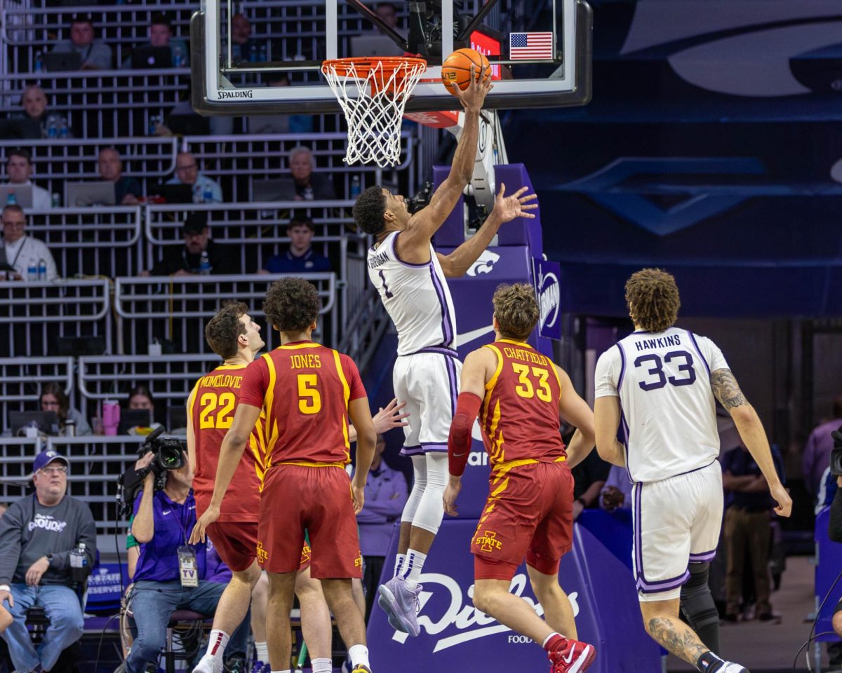 K-State senior David N'Guessan goes up for a layup against Iowa State on senior day. The Wildcats fell to the Cyclones as N'Guessan scored  19 points on 8-of-10 field goals on March 8. 