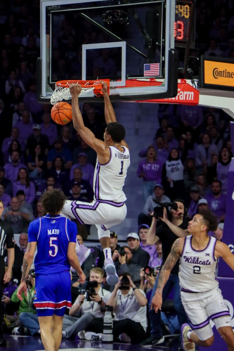 Senior foward David N'Guessan slams home a dunk as the Wildcats beat KU 81-73 in Bramlage on Feb. 8 2025. N'Guessan is a perfect 3-0 versus Kansas at Bramlage.