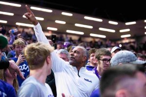 K-State head Coach Jerome Tang celebrates in the student section following a 70-67 victory over No. 16 Cincinnati to open Big 12 Conference play. Tang enters his fourth year in Manhattan next winter.